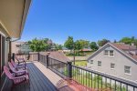 The Upper Level Family Room Gives Way to a Private Patio - The Perfect Setting for Your Morning Brew